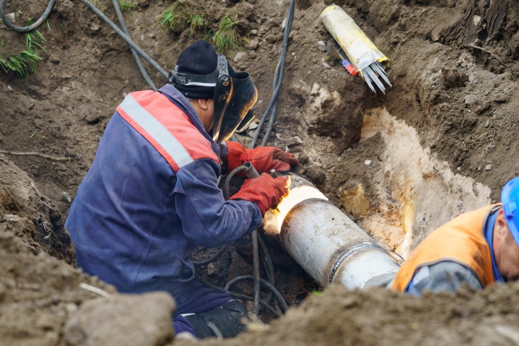 Main drain pipe being repaired